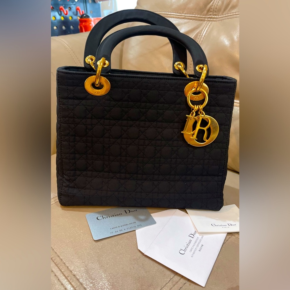 Excellent condition Authentic Dior Black Nylon Quilted Bag with Gold Accesorries